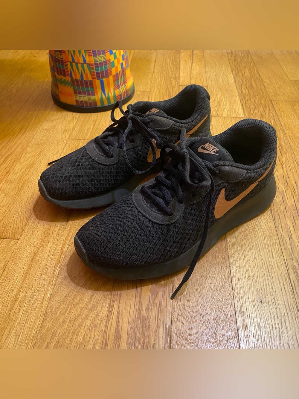Nike Black Athletic Sneakers with Metallic Rose Swoosh